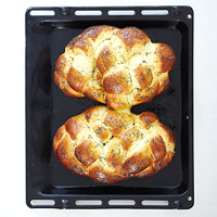Plaited bread on an oven tray, prepared at the Cookery School in London