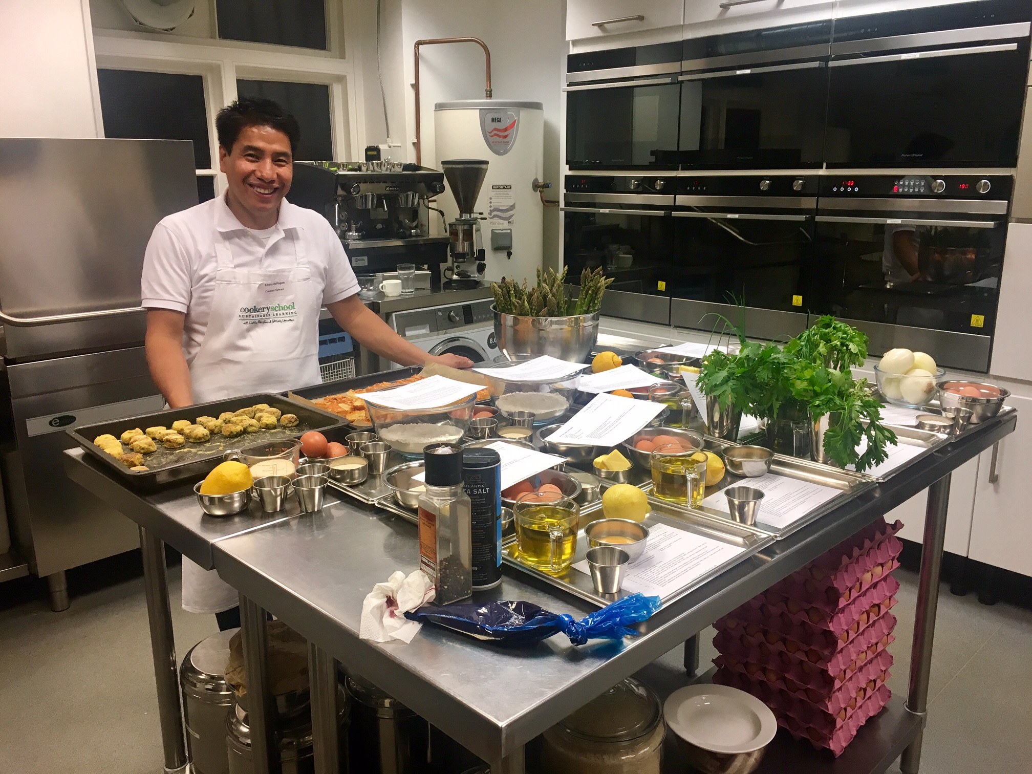 Our back of house superstar, Edwin, with all the prepped recipes and ingredients