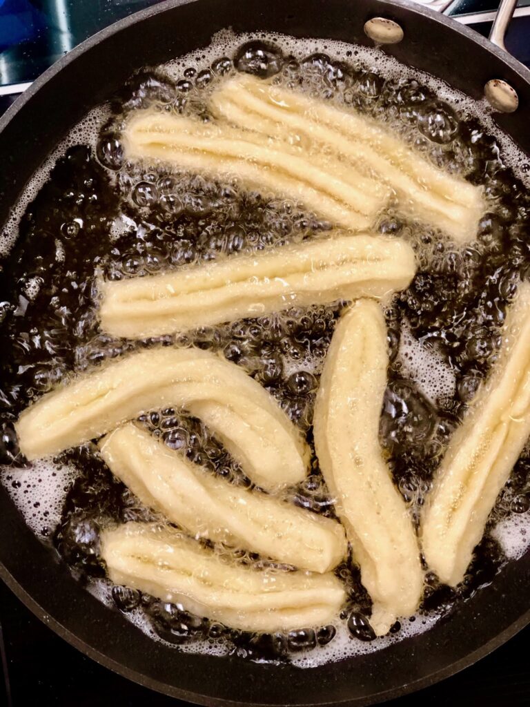 Cookery school recipe for churros in cinnamon sugar